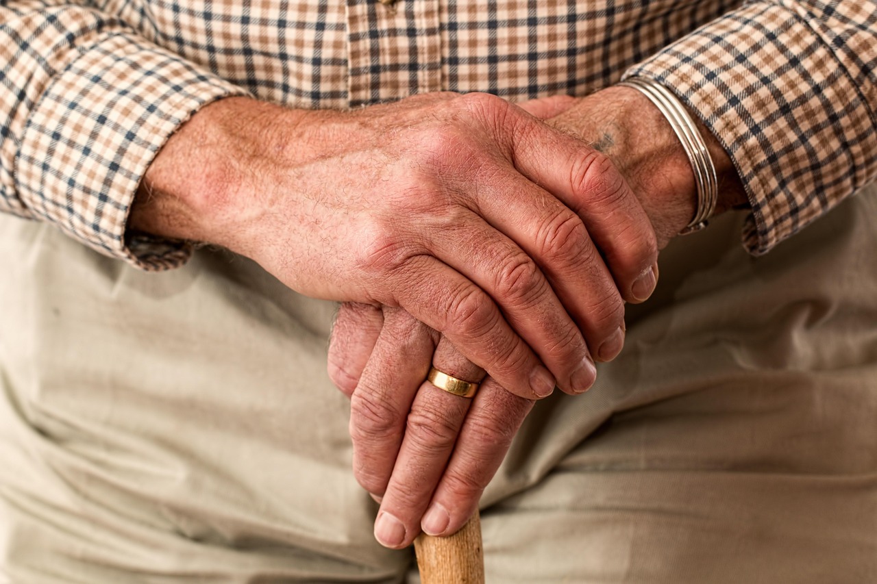 Senior woman reading a guide at home in Buffalo — illustrating this Medicare guide