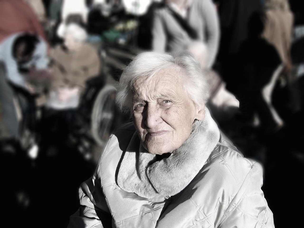 Senior woman reading a guide at home in Birmingham — illustrating this Medicare guide