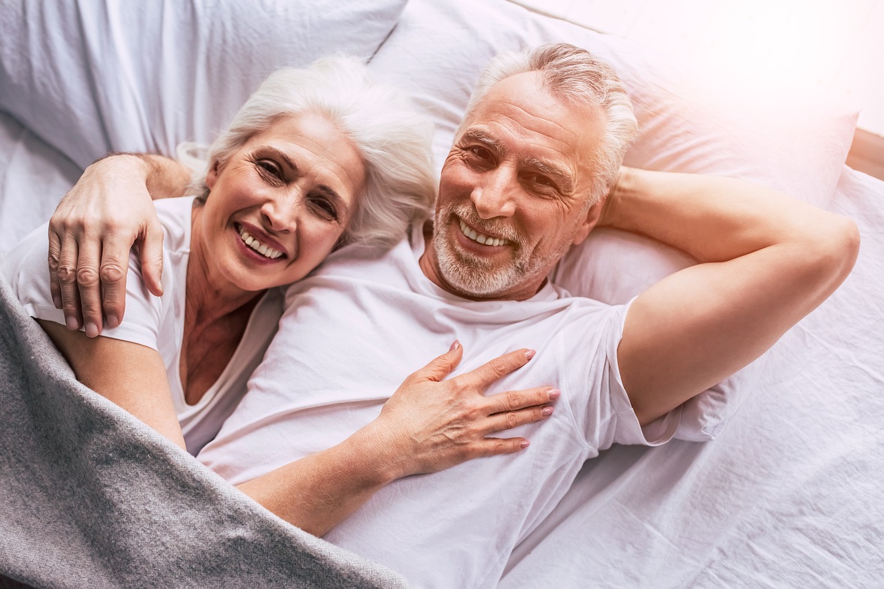 Senior couple using tablet in Providence — illustrating this Medicare guide